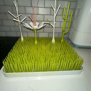 Boon bottle drying grass